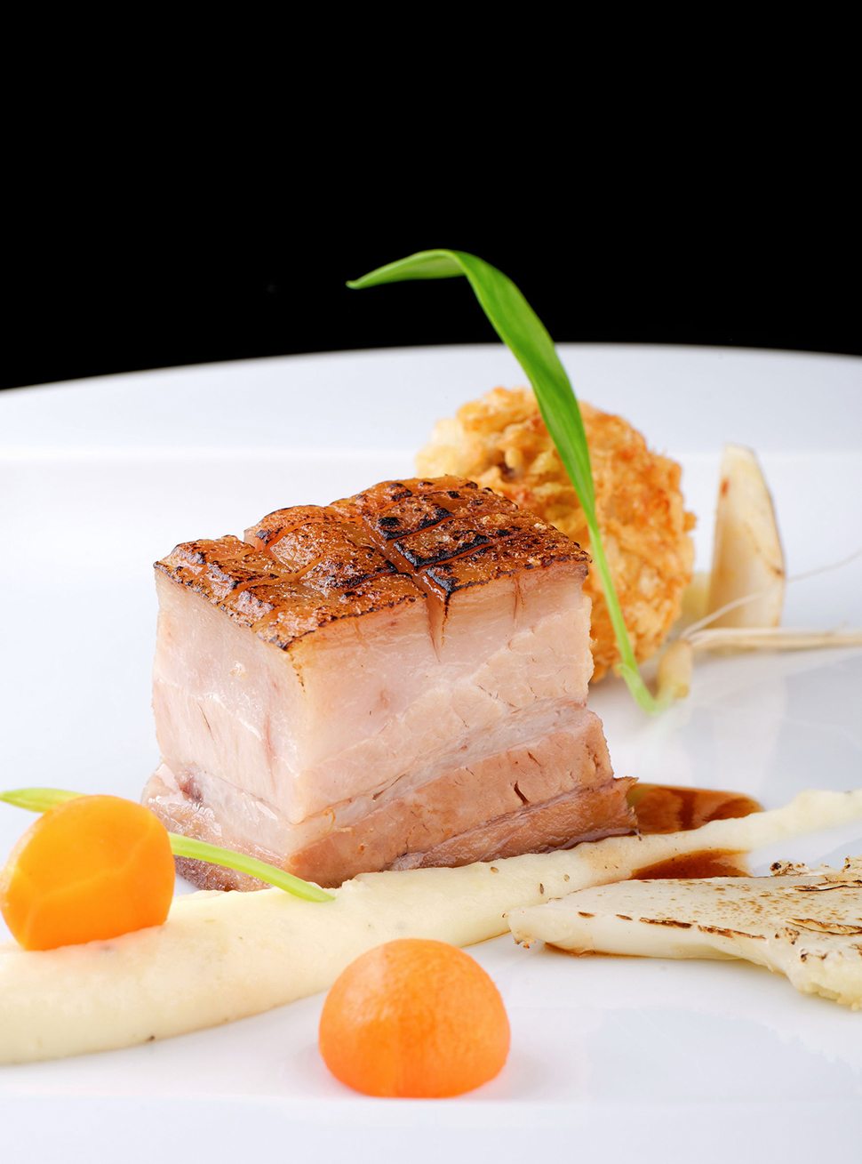 37520605 - haute cuisine, pork confit steak with a potato purree