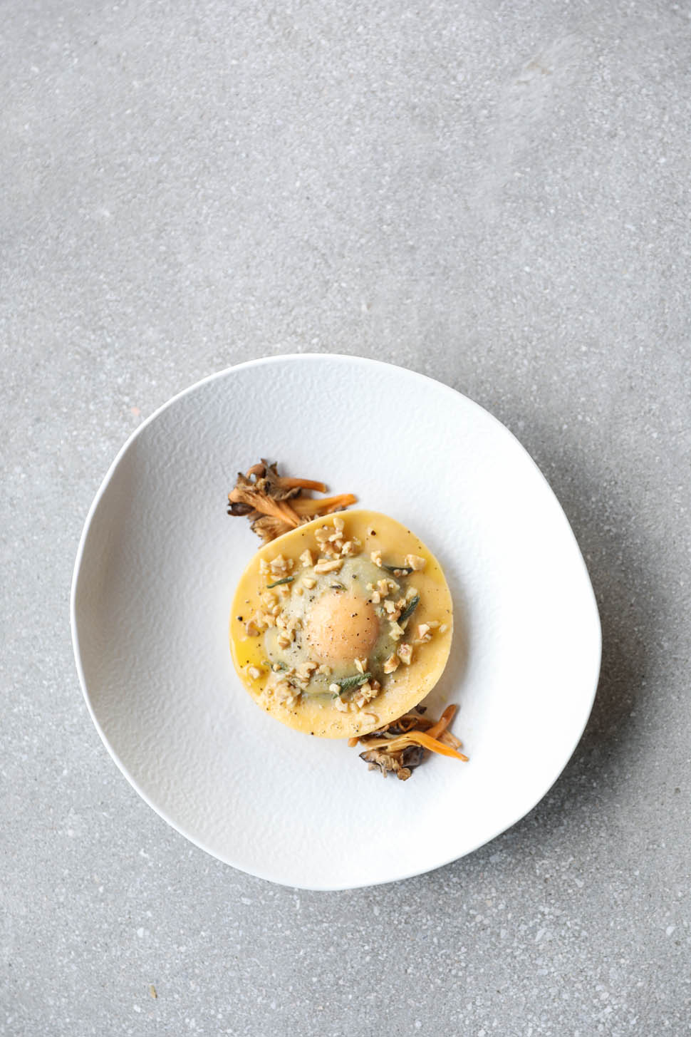 4 Homemade egg ravioli with chanterelles beurre noisette sage and hazelnuts