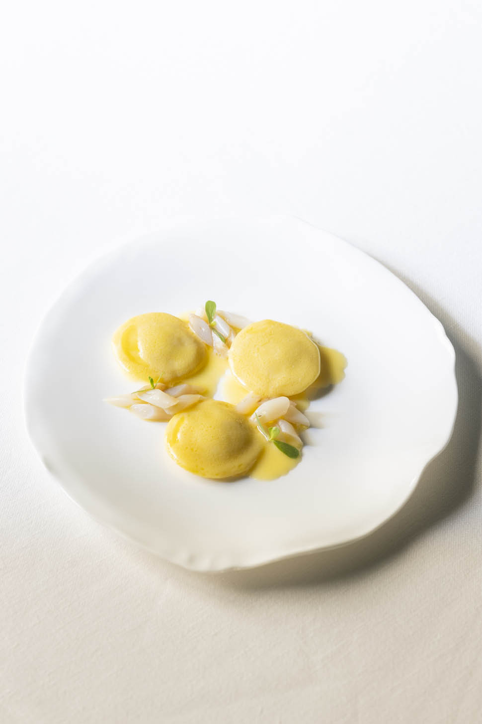 Bottoni di patate e taleggio vin jaune e cannolicchi