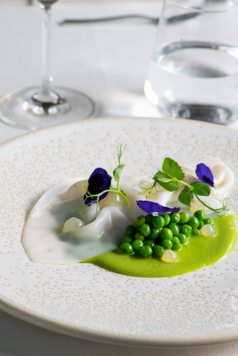Velo di seppia piselli e limone
