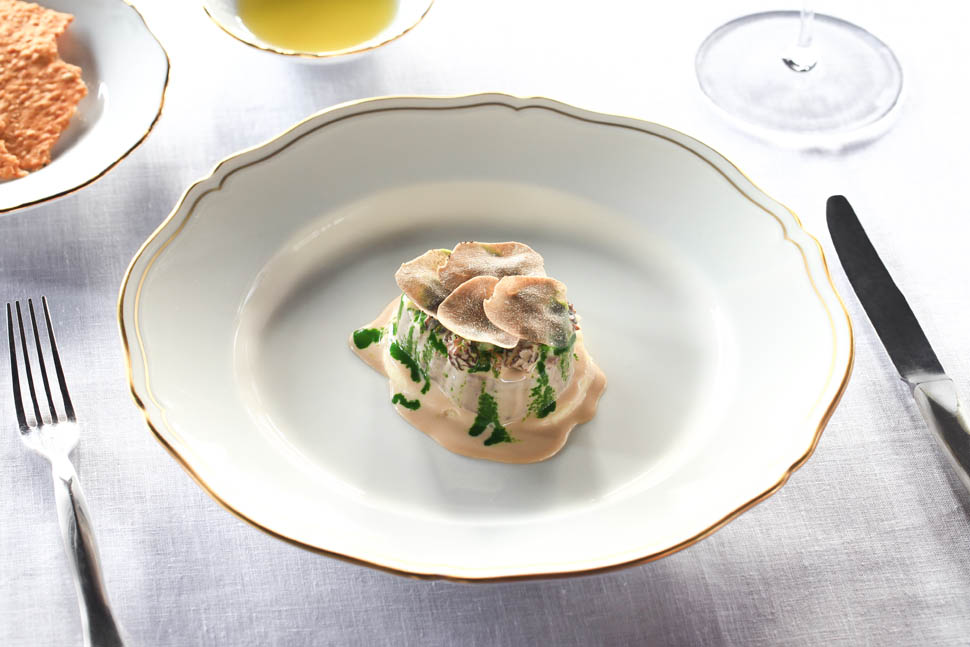 Wagyu beef fillet with asparagus black summer truffle and green pepper sauce