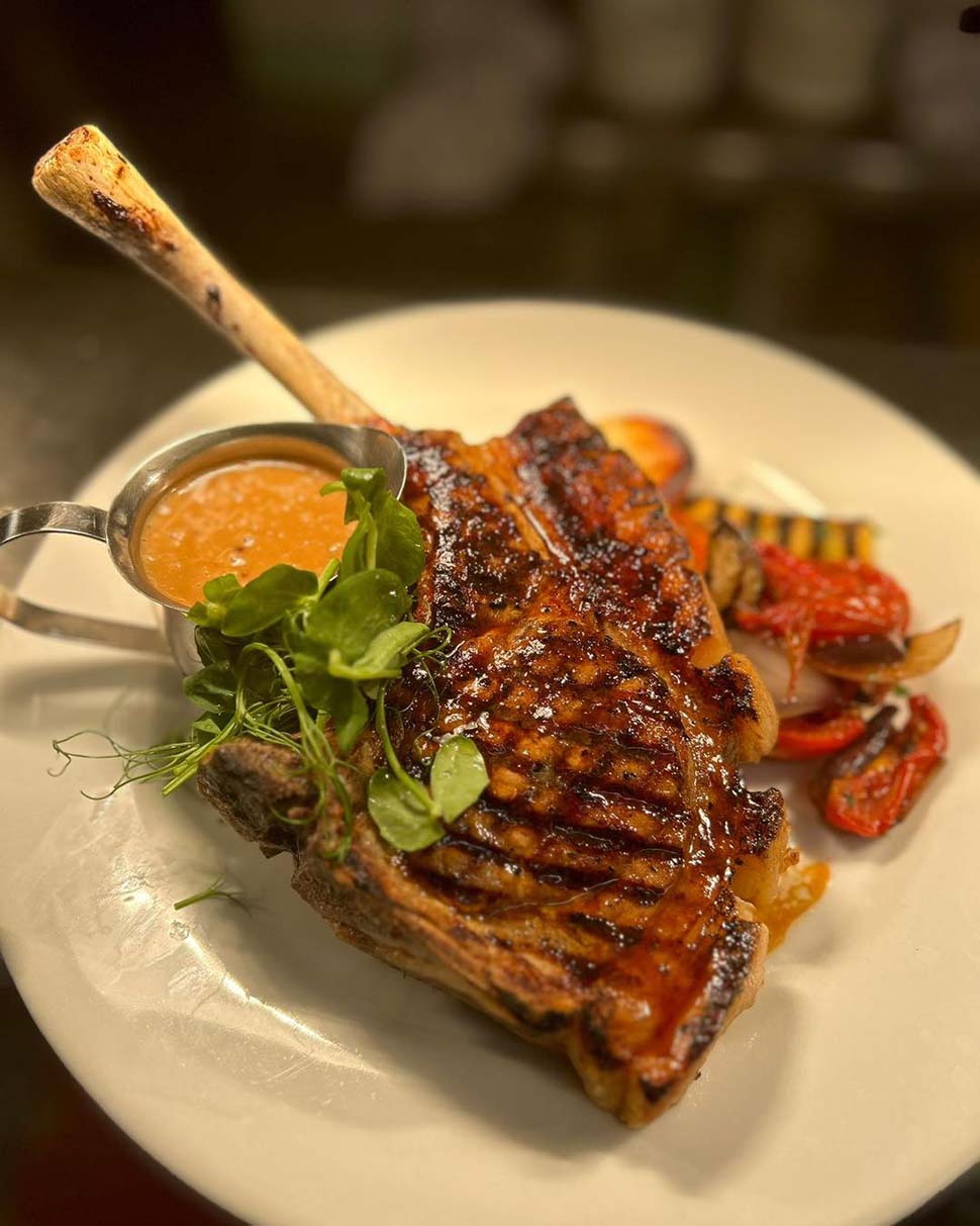 tomahawk pork steak griddled Mediterranean vegetable PS