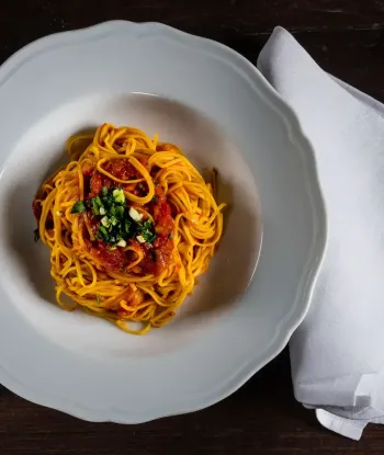 Ricette Tagliolini pomodoro prezzemolo e aglio Premiate Trattorie Italiane