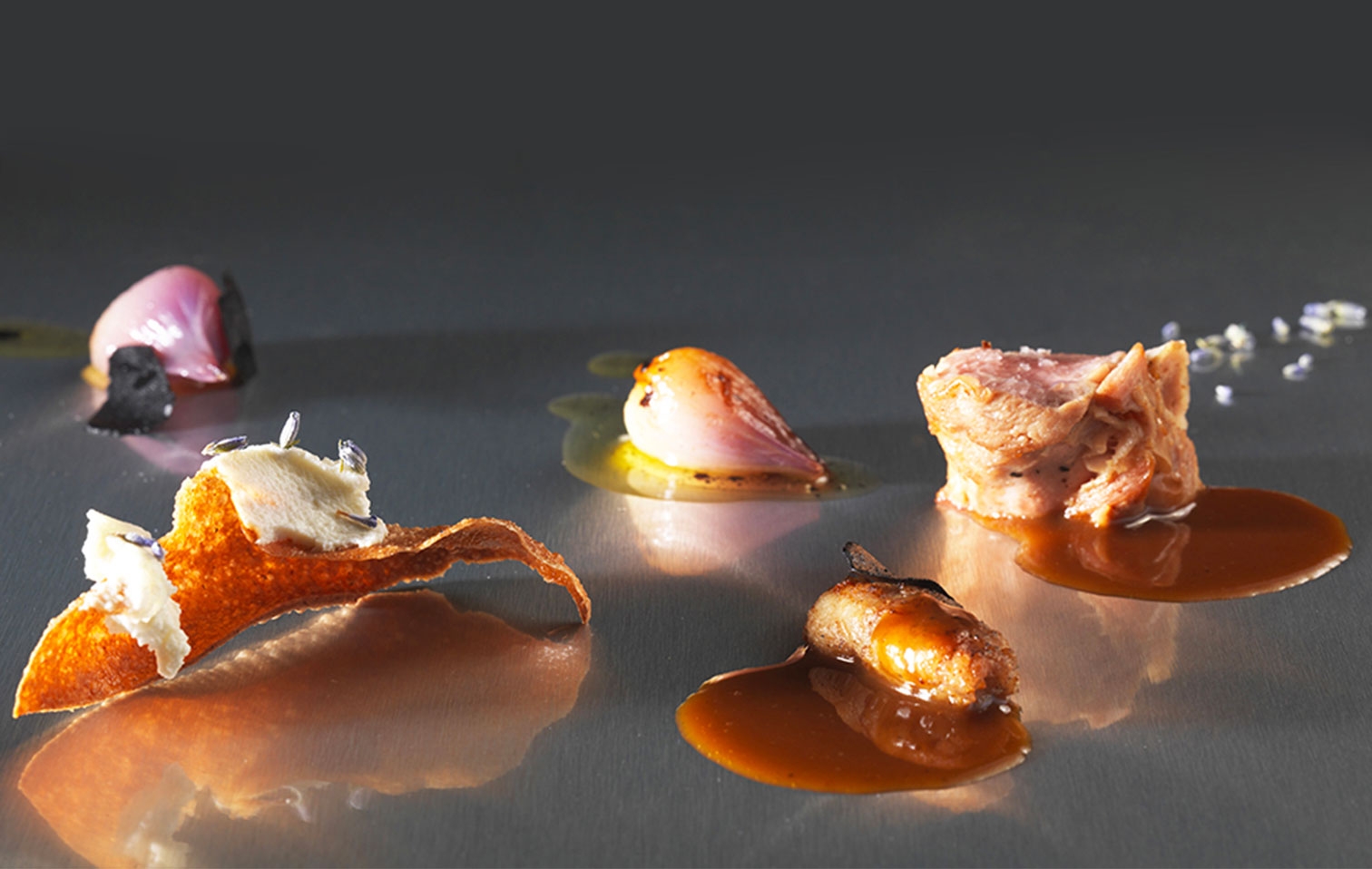 Seared lamb with charcoal-cooked spring onions and ricotta-infused puffed bread | Enrico Bartolini |