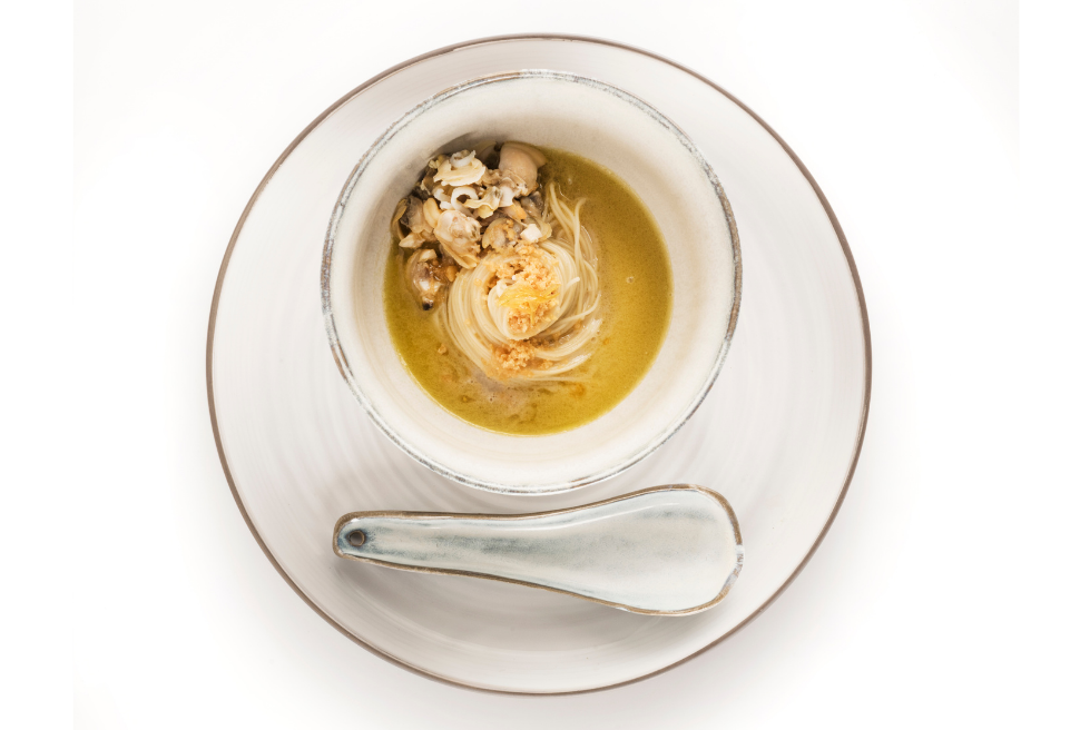Super spaghetti with Italian clams, julienne of squid, candied lemon and tarallo powder | Chef Recip